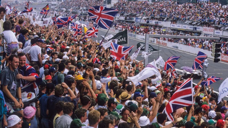 the scream of Jaguar 7-litre V12s is appreciated by the travelling support