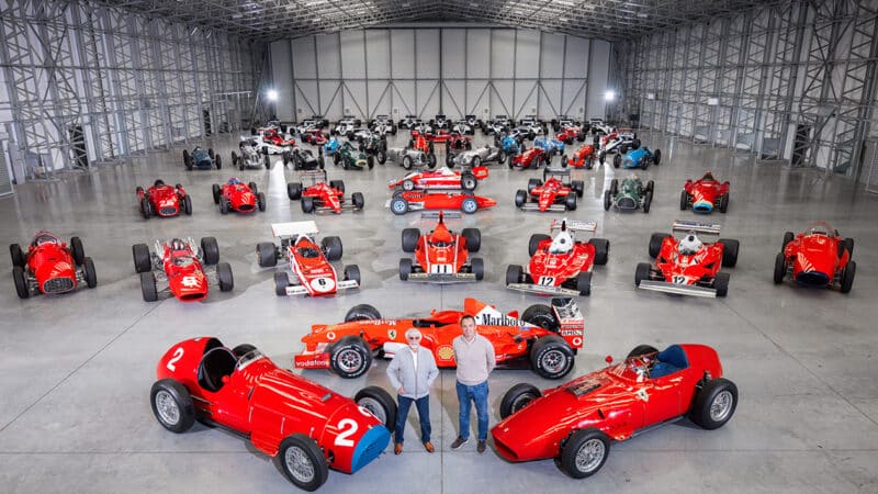 Bernie Ecclestone and Tom Hartley Junior in front of Ecclestone car collection