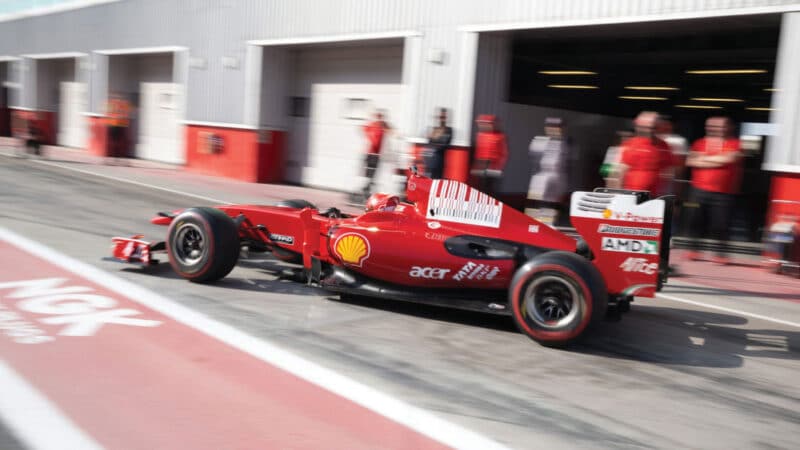 Ferrari F1 car leaving the pit lane