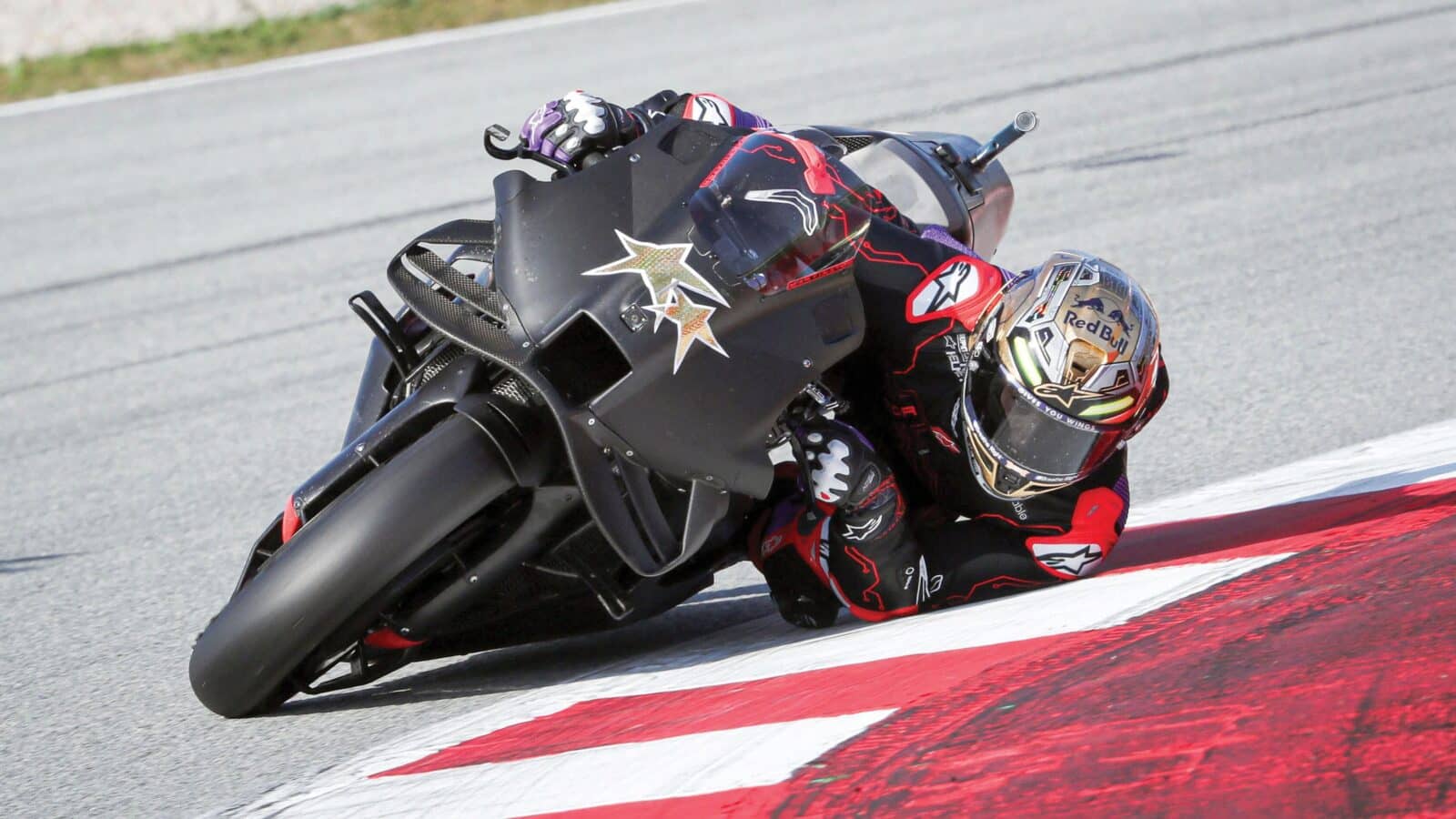 Jorge Martin leaning on bike