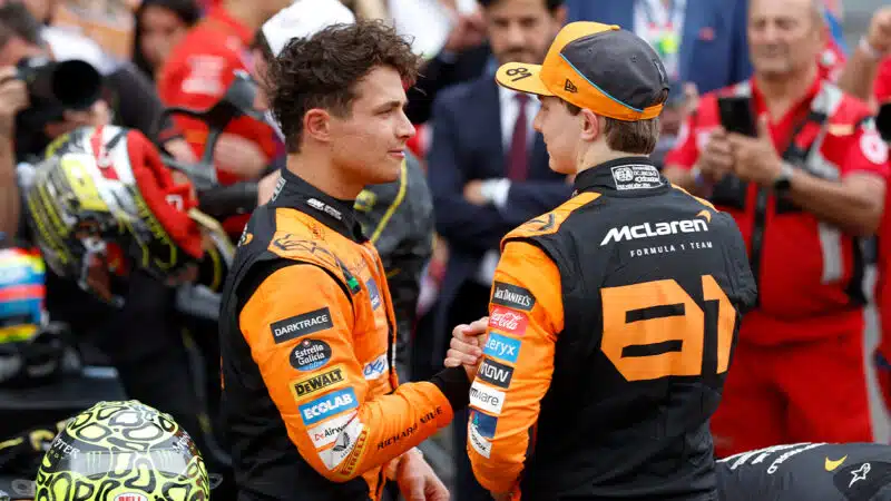 Lando Norris and Oscar Piastri shake hands at the end of the 2024 Italian Grand Prix