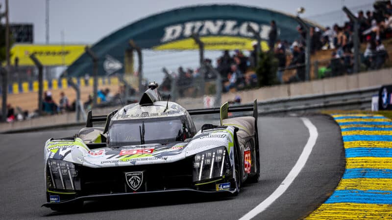 Peugeot 9X8 Hypercar in front of Dunlop Bridge at 2024 Le Mans 24 Hours