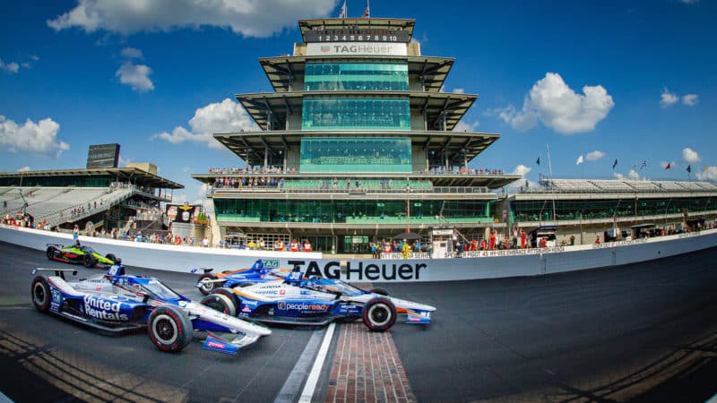 Takuma Sato crosses the line to win the 2020 Indy 500